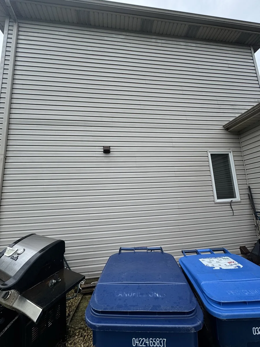 House siding after soft washing by Two Bros